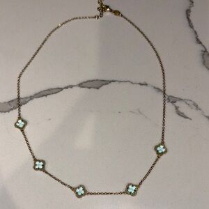 Elegant Gold and White Clover Necklace